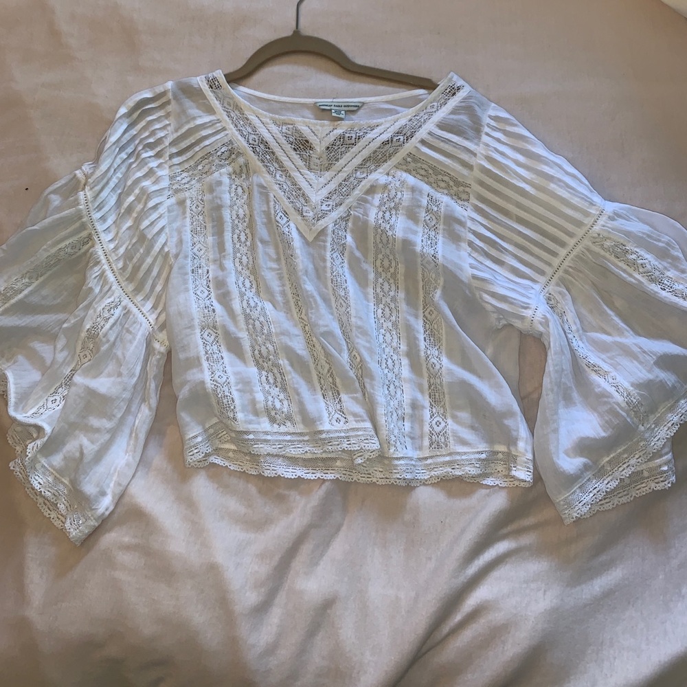 white flowy cropped blouse